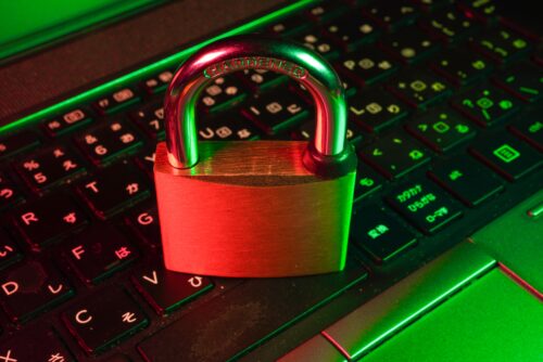 pad lock on a keyboard with red and green lighting